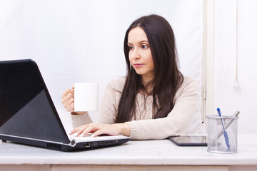 woman working at home online