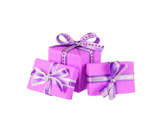 wrapped violet gift boxes with ribbon bows isolated on white