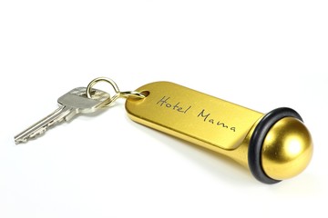 Zimmerschlüssel des Hotel Mama isoliert auf weißem Hintergrund