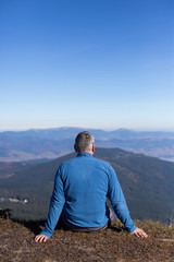 Naklejka premium Hiker trekking in the mountains. Sport and active life