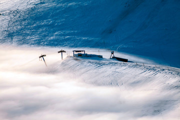 Obraz premium Peaks above clouds