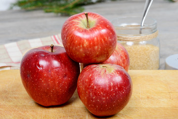 red apples on a wooden background