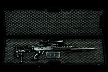 sniper rifle in a case