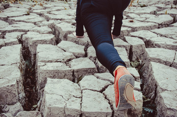 sport and lifestyle concept - woman doing running outdoors