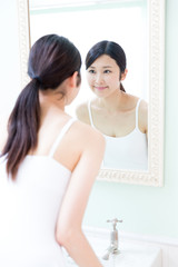 young asian woman in the makeroom