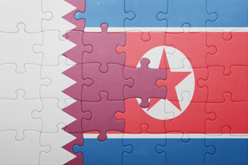 puzzle with the national flag of north korea and qatar
