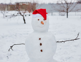 Real snowman outdoors 