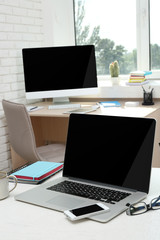 Workplace with computer in office