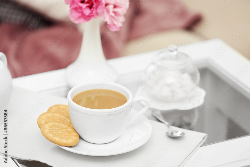 Poster Cup of coffee on table in living room