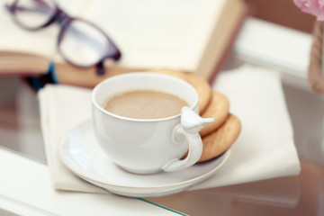 Cup of coffee on table close up