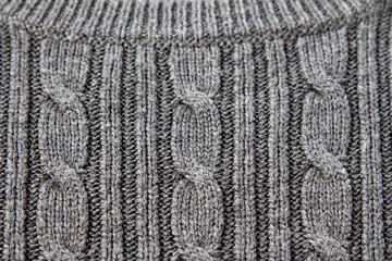 Close up on the cable to collar transition on a sweater