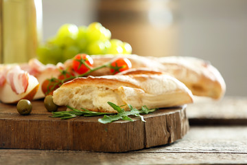 Still life with various types of Italian food and wine