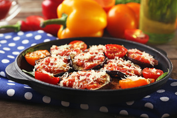Baked vegetables in pan on napkin