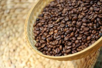 Roasted coffee beans in wattled basket