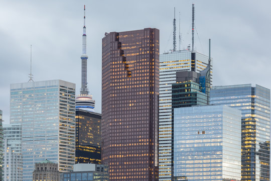  Tops of  Skyscrapers  in  the Financial District of Toronto on the grey sky background 