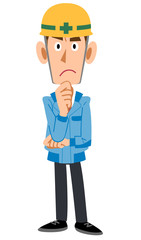 考える建築現場作業員