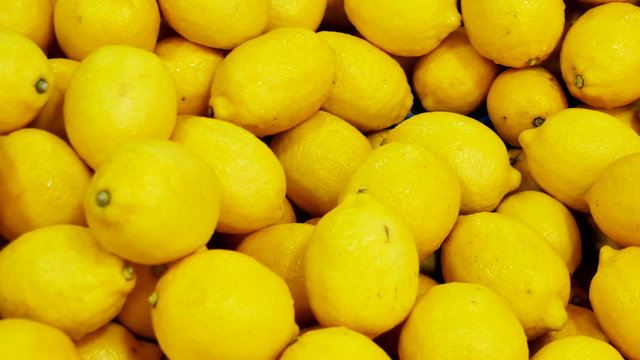 Colorful Display Of Lemons In Market 