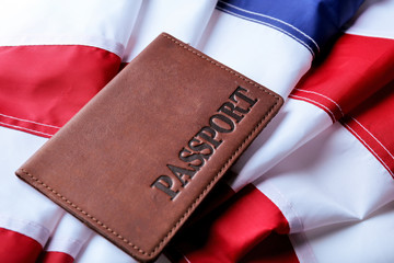 Passport lying on American Flag background