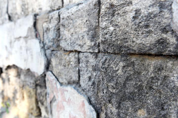Background of old cracked stone wall