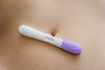 Positive pregnancy test on belly