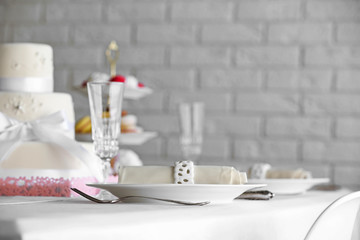 Beautiful decorated table for wedding celebration in restaurant