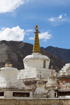 Buddhist white stupa and blue sky . Thiksey Monastery,  Leh , Ladakh, India