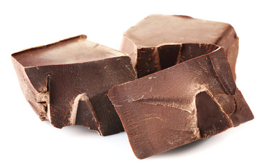 Black chocolate pieces isolated on white