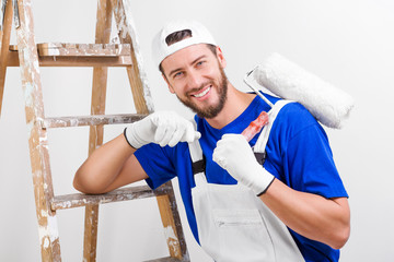 painter in white dungarees, blue t-shirt © guerrieroale