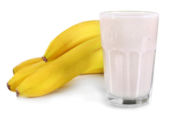 A glass of fresh cold banana smoothie, isolated on white
