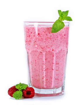 A Glass Of Fresh Cold Raspberry Smoothie With Mint, Isolated On White