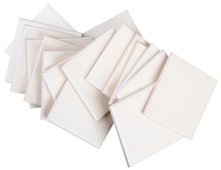 Stack of tiles on white, top view