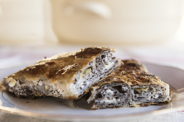 Traditional hungarian strudel, filled with pumpkin and poppy seed.