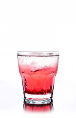 Delicious pomegranate cocktail on the white background
