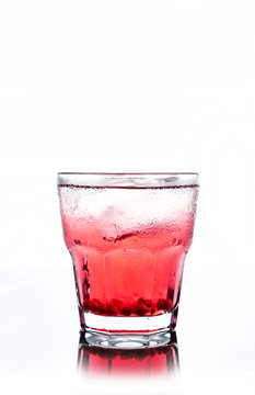 Delicious pomegranate cocktail on the white background