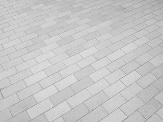 Old gray pavement tiles background