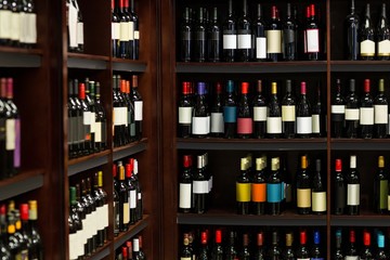 View of row bottles of wine 