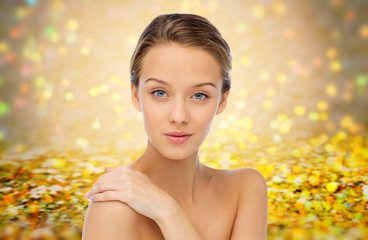 Fototapeta premium smiling young woman face and shoulders