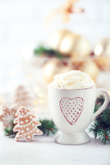 Beautiful composition with cup of cappuccino and Christmas cookies