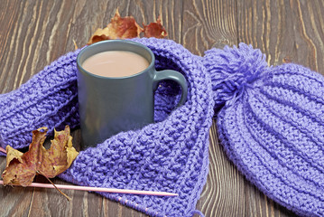 Warm cap, scarf and hot drink