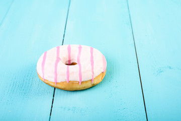 White And Pink Donut On Blue Background