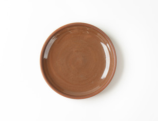 Round brown dinner plate