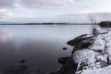 Beautiful evening next to lake at early winter
