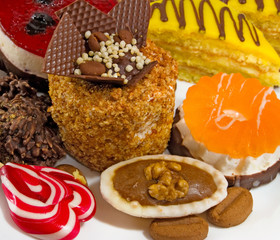 Isolated image of different delicious cakes closeup