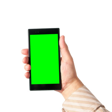 Man holds in hand tablet PC in portrait mode with green screen isolated on white. Chroma key screen for placement of your own content.
