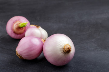 peel shallot on black board