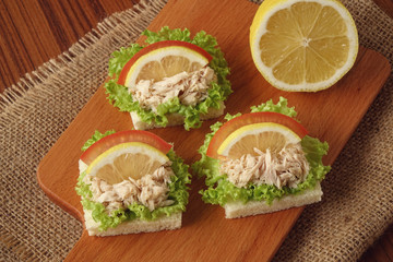 Tuna sandwich on chopping board