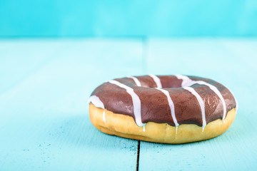 Chocolate Donut On Blue Background