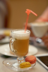 Cup of latte on a table closeup
