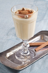 Boza and cinnamons. Fermented Turkish beverage.