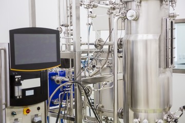 Large vat with taps and pumps